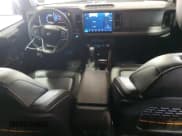 ✅ 2024 Ford Bronco Badlands • VIN: 1FMEE9BP5RLA08124 • Lot: 52100065. Listed on Copart with 6,300 mi. Free auction sales archive from the USA and detailed vehicle history report at DreamBid. Image 8.