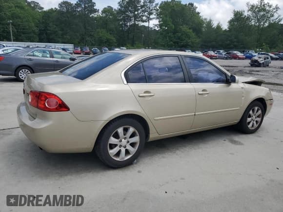 ✅ 2008 Kia Optima LX • VIN: KNAGE124085188763 • Лот: 56009095. Опубликован ранее на Copart с пробегом 263 686 миль. Бесплатный доступ к архиву аукционных продаж из США и подробный отчёт об истории автомобиля на DreamBid. Изображение 3.