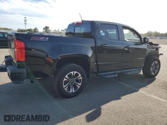 ✅ 2021 Chevrolet Colorado 4WD Z71 • VIN: 1GCGTDEN3M1142862 • Лот: 71504164. Опубликован ранее на Copart с пробегом 34 617 миль. Бесплатный доступ к архиву аукционных продаж из США и подробный отчёт об истории автомобиля на DreamBid. Изображение 3.