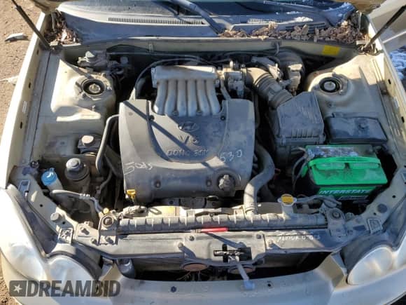 2003 Hyundai Sonata GLS z VIN KMHWF35H33A874765, wystawiony jako Copart lot #43804495 z przebiegiem 168 242 mil mil oraz Szkoda całkowita • Salvage title. Historia ofert i sprzedaży dostępna na DreamBid. Obrazek 12.