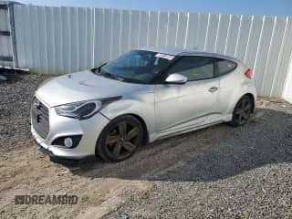 2015 Hyundai Veloster Turbo z VIN KMHTC6AE3FU235538, wystawiony jako Copart lot #80473935 z przebiegiem 103 107 mil mil oraz Czysty tytuł • Clean title. Historia ofert i sprzedaży dostępna na DreamBid. Obrazek 1.