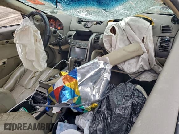 ✅ 2004 Infiniti G35 w/Leather • VIN: JNKCV54E84M826156 • Lot: 94787555. Wystawiony na Copart z przebiegiem 170 986 mil. Bezpłatny archiwum sprzedaży aukcyjnych z USA i szczegółowy raport historii pojazdu na DreamBid. Zdjęcie 8.