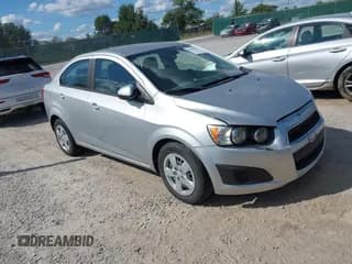 ✅ 2013 Chevrolet Sonic LS • VIN: 1G1JA5SH6D4236256 • Lot: 43068509. Listed on IAAI with 220,001 mi. Free auction sales archive from the USA and detailed vehicle history report at DreamBid. Image 1.