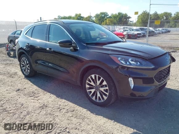 ✅ 2020 Ford Escape Titanium Hybrid • VIN: 1FMCU9DZ3LUB00519 • Lot: 43248505. Wystawiony na IAAI z przebiegiem 74 149 mil. Bezpłatny archiwum sprzedaży aukcyjnych z USA i szczegółowy raport historii pojazdu na DreamBid. Zdjęcie 1.