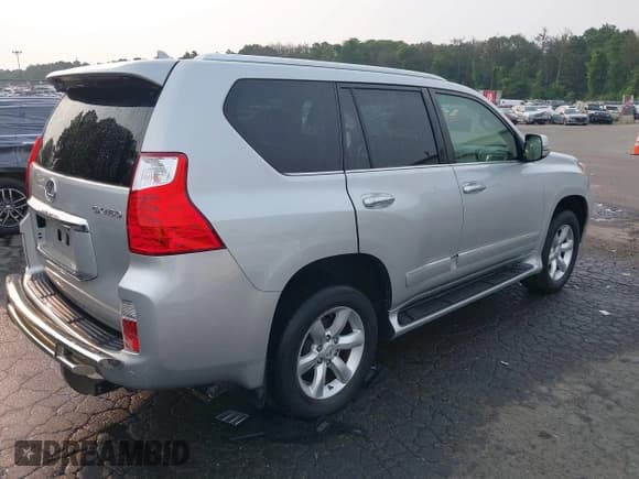 ✅ 2013 Lexus GX 460 • VIN: JTJBM7FX6D5051258 • Lot: 42909160. Listed on IAAI with 121,932 mi. Free auction sales archive from the USA and detailed vehicle history report at DreamBid. Image 4.