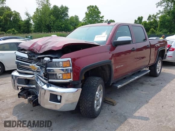 ✅ 2015 Chevrolet Silverado 2500HD LT • VIN: 1GC1KVE83FF102831 • Lot: 42411608. Listed on IAAI with 140,538 mi. Free auction sales archive from the USA and detailed vehicle history report at DreamBid. Image 2.