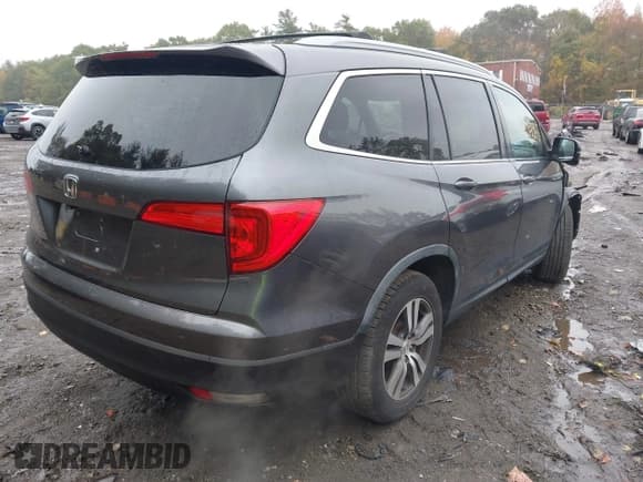 ✅ 2016 Honda Pilot EX-L • VIN: 5FNYF6H52GB026924 • Lot: 43383486. Listed on IAAI with 112,149 mi. Free auction sales archive from the USA and detailed vehicle history report at DreamBid. Image 4.