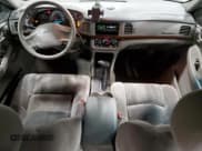 ✅ 2001 Chevrolet Impala • VIN: 2G1WF55K819337774 • Lot: 92218645. Wystawiony na Copart z przebiegiem 155 086 mil. Bezpłatny archiwum sprzedaży aukcyjnych z USA i szczegółowy raport historii pojazdu na DreamBid. Zdjęcie 8.