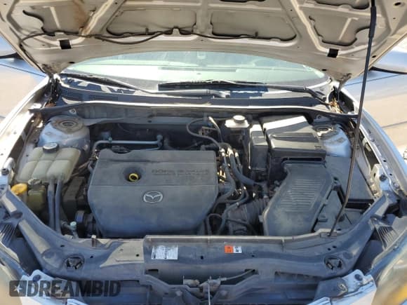 ✅ 2007 Mazda 3 i Touring • VIN: JM1BK32FX71764187 • Лот: 86643935. Опубликован ранее на Copart с пробегом 249 651 миль. Бесплатный доступ к архиву аукционных продаж из США и подробный отчёт об истории автомобиля на DreamBid. Изображение 11.