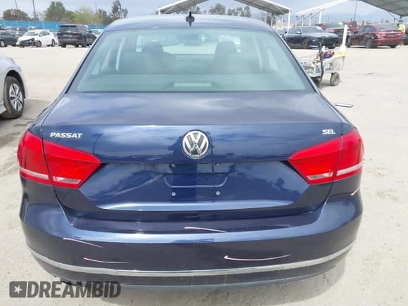 ✅ 2013 Volkswagen Passat SEL Premium • VIN: 1VWCP7A39DC100612 • Лот: 41753457. Опубликован ранее на IAAI с пробегом 76 930 миль. Бесплатный доступ к архиву аукционных продаж из США и подробный отчёт об истории автомобиля на DreamBid. Изображение 17.