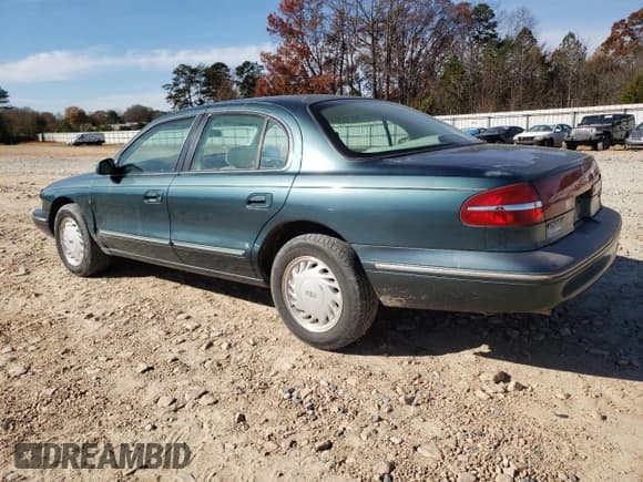 ✅ 1995 Lincoln Continental • VIN: 1LNLM97V0SY745547 • Лот: 93216315. Опубликован ранее на Copart с пробегом 97 068 миль. Бесплатный доступ к архиву аукционных продаж из США и подробный отчёт об истории автомобиля на DreamBid. Изображение 2.