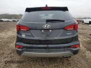 ✅ 2018 Hyundai Santa Fe 2.4L • VIN: 5NMZU3LB3JH064948 • Lot: 93242405. Listed on Copart with 107,584 mi. Free auction sales archive from the USA and detailed vehicle history report at DreamBid. Image 6.