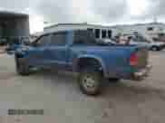 2002 Dodge Dakota Sport z VIN 1B7HG38N22S696268, wystawiony jako Copart lot #78382174 z przebiegiem 239 879 mil mil oraz Szkoda całkowita • Salvage title. Historia ofert i sprzedaży dostępna na DreamBid. Obrazek 2.