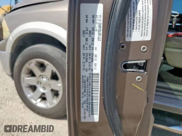 2009 Dodge 1500 Laramie with VIN 1D3HB13T09S742285, listed as a Copart auction lot 65607865 with 250,763 mi miles and Salvage title. Bid and sale history available at DreamBid. Image 12.