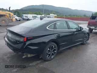 2024 Hyundai Sonata SEL with VIN KMHL64JAXRA385676, listed as a IAAI auction lot 43134564 with 16,767 mi miles and . Bid and sale history available at DreamBid. Image 4.