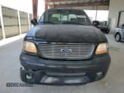 ✅ 2003 Ford F-150 Harley-Davidson • VIN: 1FTRW07343KD83293 • Lot: 55600275. Listed on Copart with 176,233 mi. Free auction sales archive from the USA and detailed vehicle history report at DreamBid. Image 5.