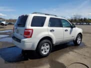 ✅ 2010 Ford Escape Hybrid • VIN: 1FMCU4K30AKB92313 • Lot: 54142145. Wystawiony na Copart z przebiegiem 159 175 mil. Bezpłatny archiwum sprzedaży aukcyjnych z USA i szczegółowy raport historii pojazdu na DreamBid. Zdjęcie 3.