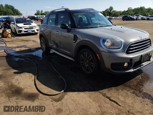 ✅ 2019 MINI Countryman Cooper • VIN: WMZYV5C55K3F58617 • Лот: 65734945. Опубликован ранее на Copart с пробегом 98 271 миль. Бесплатный доступ к архиву аукционных продаж из США и подробный отчёт об истории автомобиля на DreamBid. Изображение 14.