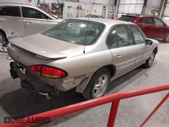 ✅ 1999 Pontiac Bonneville SE • VIN: 1G2HX52K6XH219099 • Lot: 43634147. Wystawiony na IAAI z przebiegiem 103 457 mil. Bezpłatny archiwum sprzedaży aukcyjnych z USA i szczegółowy raport historii pojazdu na DreamBid. Zdjęcie 4.