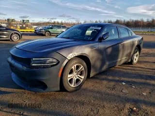 ✅ 2015 Dodge Charger SE • VIN: 2C3CDXBG1FH740900 • Lot: 95194385. Listed on Copart with 92,339 mi. Free auction sales archive from the USA and detailed vehicle history report at DreamBid. Image 1.