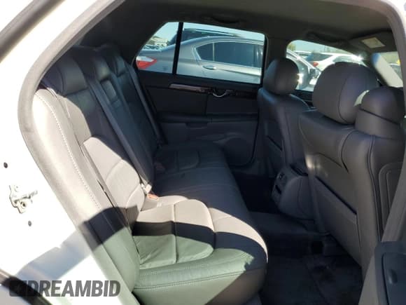 ✅ 2004 Cadillac DeVille • VIN: 1G6KD54Y24U188953 • Lot: 73699764. Listed on Copart with 94,631 mi. Free auction sales archive from the USA and detailed vehicle history report at DreamBid. Image 10.