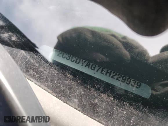 ✅ 2014 Dodge Challenger SXT • VIN: 2C3CDYAG7EH229939 • Lot: 84517094. Wystawiony na Copart z przebiegiem 91 462 mil. Bezpłatny archiwum sprzedaży aukcyjnych z USA i szczegółowy raport historii pojazdu na DreamBid. Zdjęcie 13.