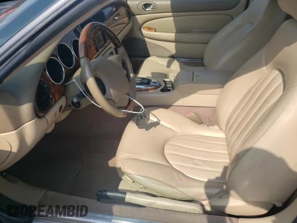 ✅ 2003 Jaguar XK • VIN: SAJDA42C532A36020 • Lot: 60656805. Wystawiony na Copart z przebiegiem 65 020 mil. Bezpłatny archiwum sprzedaży aukcyjnych z USA i szczegółowy raport historii pojazdu na DreamBid. Zdjęcie 7.