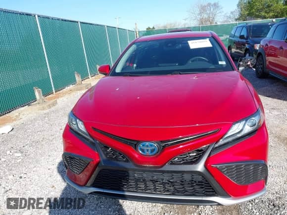 2021 Toyota Camry Hybrid XSE with VIN 4T1K31AK6MU030152, listed as a IAAI auction lot 41878099 with 81,333 mi miles and . Bid and sale history available at DreamBid. Image 6.