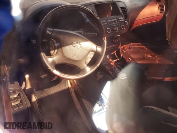 ✅ 2005 Infiniti Q45 • VIN: JNKBF01A75M100612 • Лот: 73658824. Опубликован ранее на Copart с пробегом Не указан. Бесплатный доступ к архиву аукционных продаж из США и подробный отчёт об истории автомобиля на DreamBid. Изображение 8.