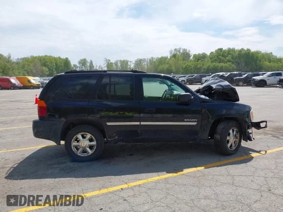 ✅ 2006 GMC Envoy SLE • VIN: 1GKDT13S562240769 • Lot: 42255973. Listed on IAAI with 183,423 mi. Free auction sales archive from the USA and detailed vehicle history report at DreamBid. Image 13.
