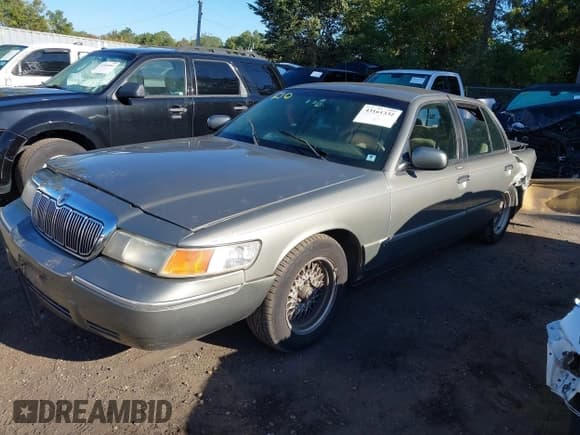 ✅ 2001 Mercury Grand Marquis LS • VIN: 2MEFM75W31X691787 • Лот: 43161332. Опубликован ранее на IAAI с пробегом 138 070 миль. Бесплатный доступ к архиву аукционных продаж из США и подробный отчёт об истории автомобиля на DreamBid. Изображение 2.