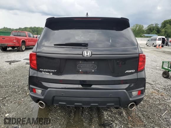 ✅ 2022 Honda Passport EX-L • VIN: 5FNYF8H56NB018477 • Lot: 68481775. Listed on Copart with 67,175 mi. Free auction sales archive from the USA and detailed vehicle history report at DreamBid. Image 6.