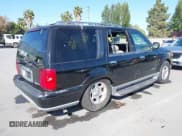 ✅ 2002 Lincoln Navigator • VIN: 5LMEU27R12LJ11127 • Lot: 42193994. Wystawiony na IAAI z przebiegiem 161 749 mil. Bezpłatny archiwum sprzedaży aukcyjnych z USA i szczegółowy raport historii pojazdu na DreamBid. Zdjęcie 4.