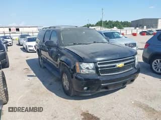 2014 Chevrolet Suburban LT z VIN 1GNSCJE05ER195862, wystawiony jako IAAI lot #43210972 z przebiegiem 296 051 mil mil oraz . Historia ofert i sprzedaży dostępna na DreamBid. Obrazek 1.