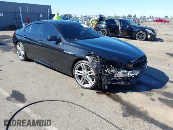 ✅ 2015 BMW 6 Series 650i • VIN: WBA6B2C57FD799149 • Lot: 43461719. Wystawiony na IAAI z przebiegiem 97 464 mil. Bezpłatny archiwum sprzedaży aukcyjnych z USA i szczegółowy raport historii pojazdu na DreamBid. Zdjęcie 1.