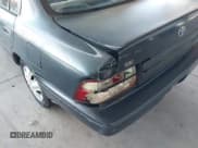 ✅ 1997 Toyota Corolla • VIN: 1NXBA02E7VZ525731 • Лот: 42598348. Опубликован ранее на IAAI с пробегом 257 585 миль. Бесплатный доступ к архиву аукционных продаж из США и подробный отчёт об истории автомобиля на DreamBid. Изображение 6.