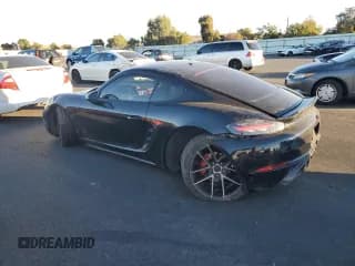 ✅ 2018 Porsche 718 Cayman • VIN: WP0AA2A88JK260346 • Лот: 90382525. Опубликован ранее на Copart с пробегом 97 503 миль. Бесплатный доступ к архиву аукционных продаж из США и подробный отчёт об истории автомобиля на DreamBid. Изображение 2.