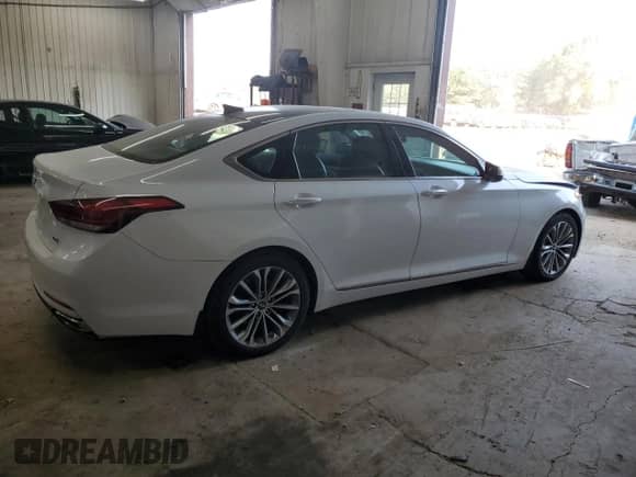 2016 Hyundai Genesis 3.8L z VIN KMHGN4JE7GU132916, wystawiony jako Copart lot #75398344 z przebiegiem 88 018 mil mil oraz Szkoda całkowita • Salvage title. Historia ofert i sprzedaży dostępna na DreamBid. Obrazek 3.