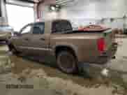 2010 Dodge Dakota SXT z VIN 1D7CW3GP2AS104212, wystawiony jako Copart lot #44062435 z przebiegiem 203 233 mil mil oraz Czysty tytuł • Clean title. Historia ofert i sprzedaży dostępna na DreamBid. Obrazek 2.