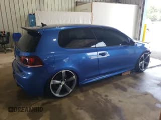 ✅ 2012 Volkswagen Golf R w/Sunroof & Navi • VIN: WVWRF7AJ3CW282187 • Лот: 60169325. Опубликован ранее на Copart с пробегом 137 822 миль. Бесплатный доступ к архиву аукционных продаж из США и подробный отчёт об истории автомобиля на DreamBid. Изображение 3.