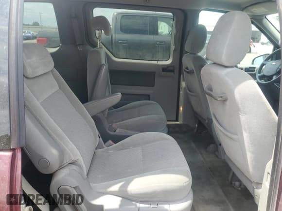 ✅ 2006 Ford Freestar SEL • VIN: 2FMZA52226BA05901 • Лот: 59630215. Опубликован ранее на Copart с пробегом Не указан. Бесплатный доступ к архиву аукционных продаж из США и подробный отчёт об истории автомобиля на DreamBid. Изображение 11.