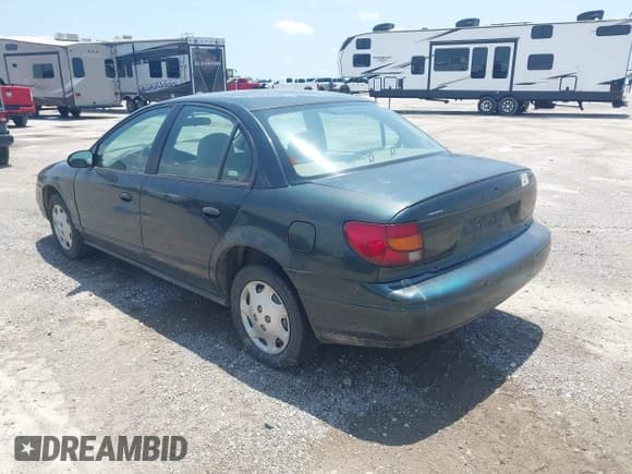 ✅ 2000 Saturn SL • VIN: 1G8ZH5280YZ180615 • Lot: 42491523. Wystawiony na IAAI z przebiegiem 157 550 mil. Bezpłatny archiwum sprzedaży aukcyjnych z USA i szczegółowy raport historii pojazdu na DreamBid. Zdjęcie 3.