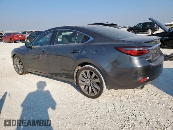 ✅ 2018 Mazda 6 Signature • VIN: JM1GL1XY4J1320666 • Lot: 84801675. Listed on Copart with 100,363 mi. Free auction sales archive from the USA and detailed vehicle history report at DreamBid. Image 2.