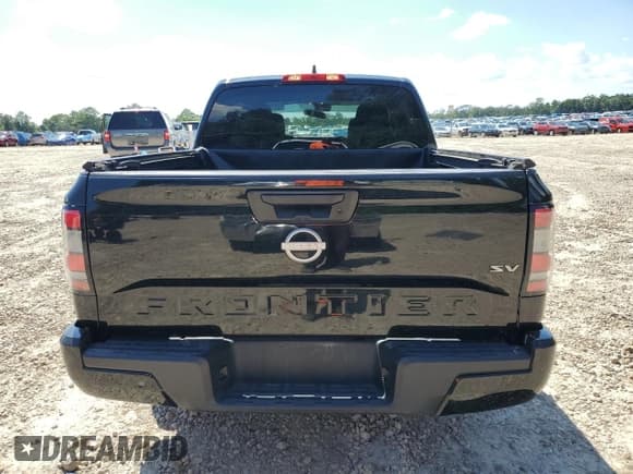 ✅ 2022 Nissan Frontier SV • VIN: 1N6ED1EJ4NN692045 • Lot: 66761695. Wystawiony na Copart z przebiegiem 58 528 mil. Bezpłatny archiwum sprzedaży aukcyjnych z USA i szczegółowy raport historii pojazdu na DreamBid. Zdjęcie 6.