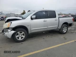 ✅ 2004 Nissan Titan SE • VIN: 1N6AA07B74N573573 • Lot: 90843175. Listed on Copart with 263,505 mi. Free auction sales archive from the USA and detailed vehicle history report at DreamBid. Image 1.