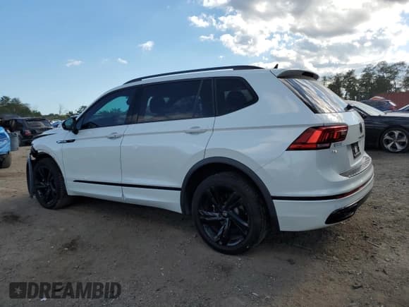✅ 2023 Volkswagen Tiguan SE R-Line Black • VIN: 3VV8B7AX8PM018854 • Лот: 85298625. Опубликован ранее на Copart с пробегом 43 448 миль. Бесплатный доступ к архиву аукционных продаж из США и подробный отчёт об истории автомобиля на DreamBid. Изображение 2.