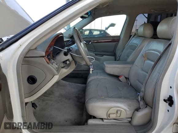 ✅ 2000 Cadillac DeVille • VIN: 1G6KD54Y2YU272566 • Lot: 70886454. Listed on Copart with 152,690 mi. Free auction sales archive from the USA and detailed vehicle history report at DreamBid. Image 7.