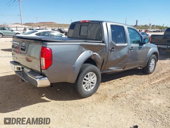 ✅ 2016 Nissan Frontier S • VIN: 1N6AD0ER2GN762014 • Lot: 43614108. Listed on IAAI with 80,417 mi. Free auction sales archive from the USA and detailed vehicle history report at DreamBid. Image 4.
