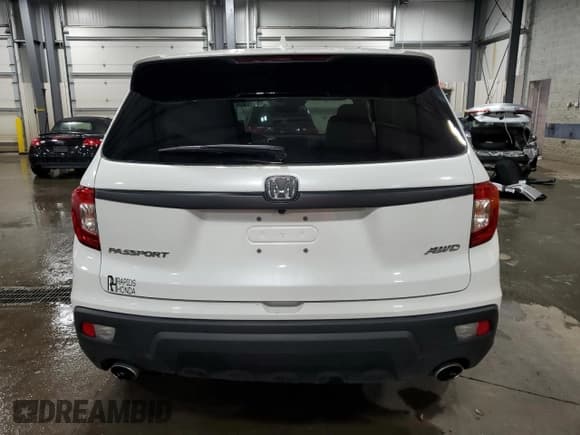 ✅ 2020 Honda Passport EX-L • VIN: 5FNYF8H59LB016607 • Lot: 69246785. Listed on Copart with 84,042 mi. Free auction sales archive from the USA and detailed vehicle history report at DreamBid. Image 6.