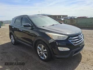 ✅ 2014 Hyundai Santa Fe • VIN: 5XYZUDLAXEG200294 • Лот: 69449845. Опубликован ранее на Copart с пробегом 128 035 миль. Бесплатный доступ к архиву аукционных продаж из США и подробный отчёт об истории автомобиля на DreamBid. Изображение 4.